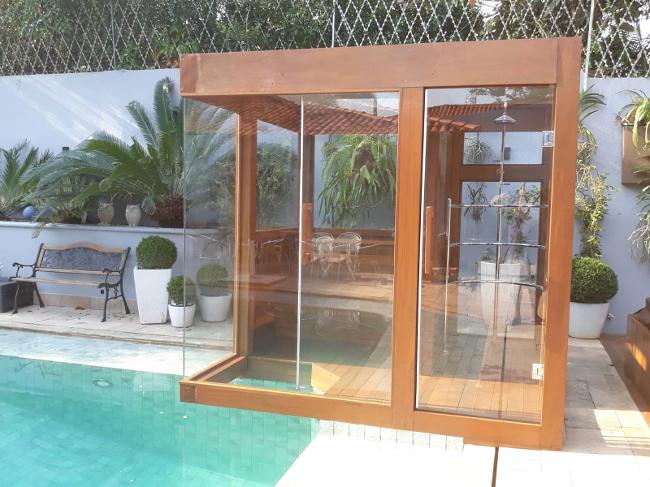sauna conjugada com piscina de madeira